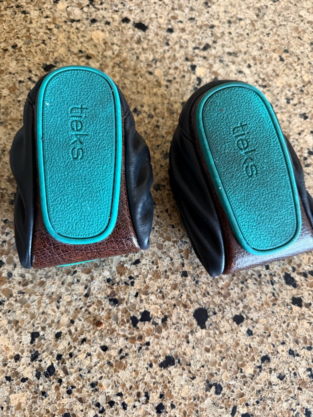 Tieks Foldable Flats in Black worn twice
